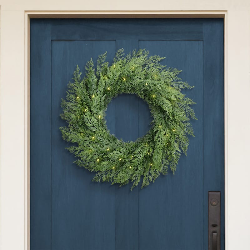 Puleo International 24" Pre-Lit Battery-Operated Artificial Flocked Wreath with Twinkle Rice Lights