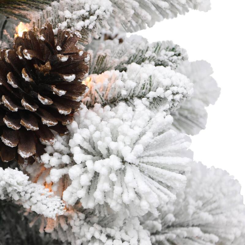 4.5' Potted Flocked Pine Slim Artificial Christmas Tree, Clear Lights - 4.5 Foot