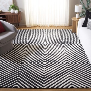 SAFAVIEH Handmade Ebony Dyrfinna Modern Wool Rug