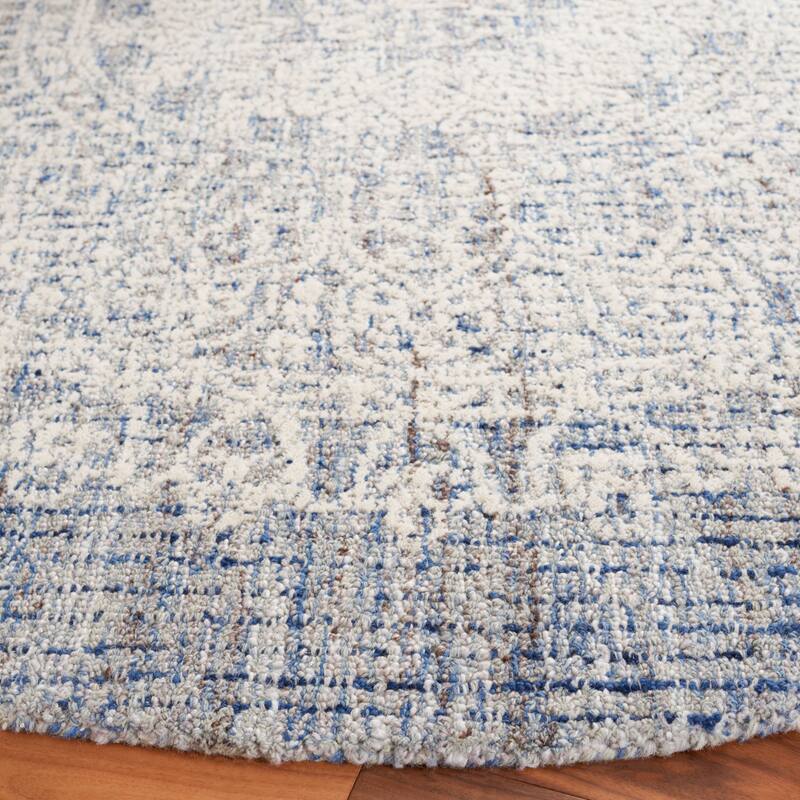 SAFAVIEH Handmade Ebony Satoko Medallion Wool Rug