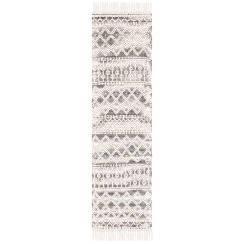 SAFAVIEH Handmade Natura Velitchka Wool Fringe Rug
