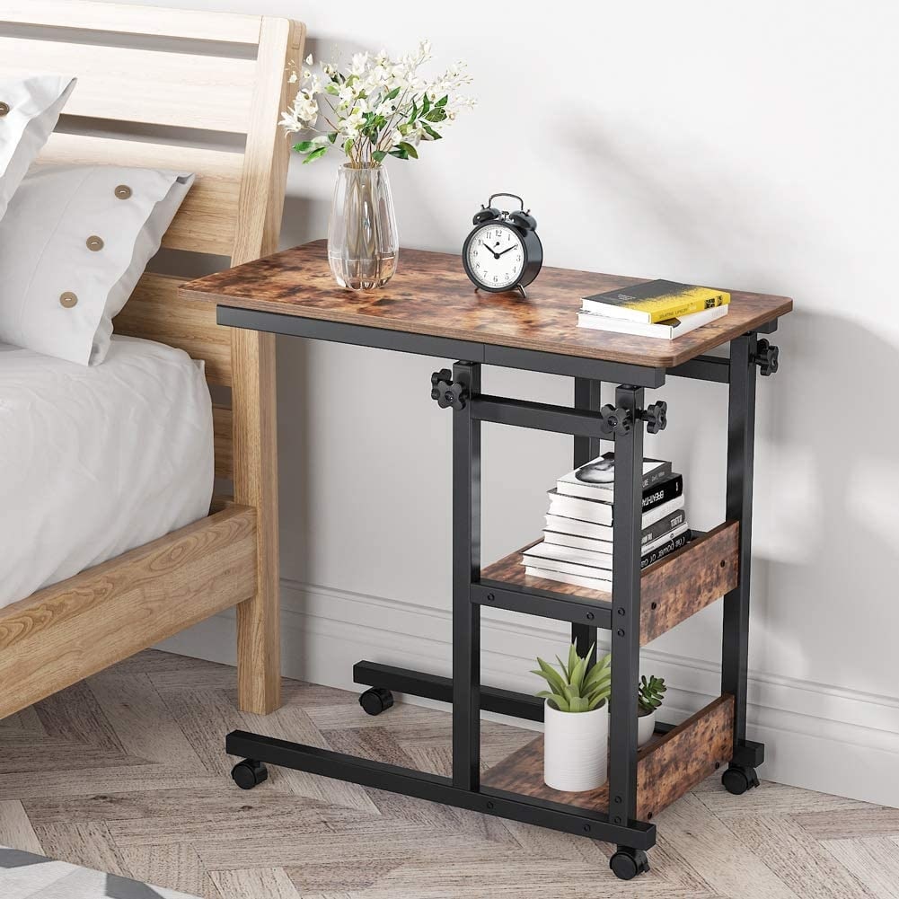 https://ak1.ostkcdn.com/images/products/is/images/direct/90428f35f5cd4fe7cd37459b3d737cc9faa774f2/Height-Adjustable-C-Table-with-Storage-Shelves-and-Wheels%2C-Mobile-Sofa-Side-Table-End-Table-Snack-Table.jpg