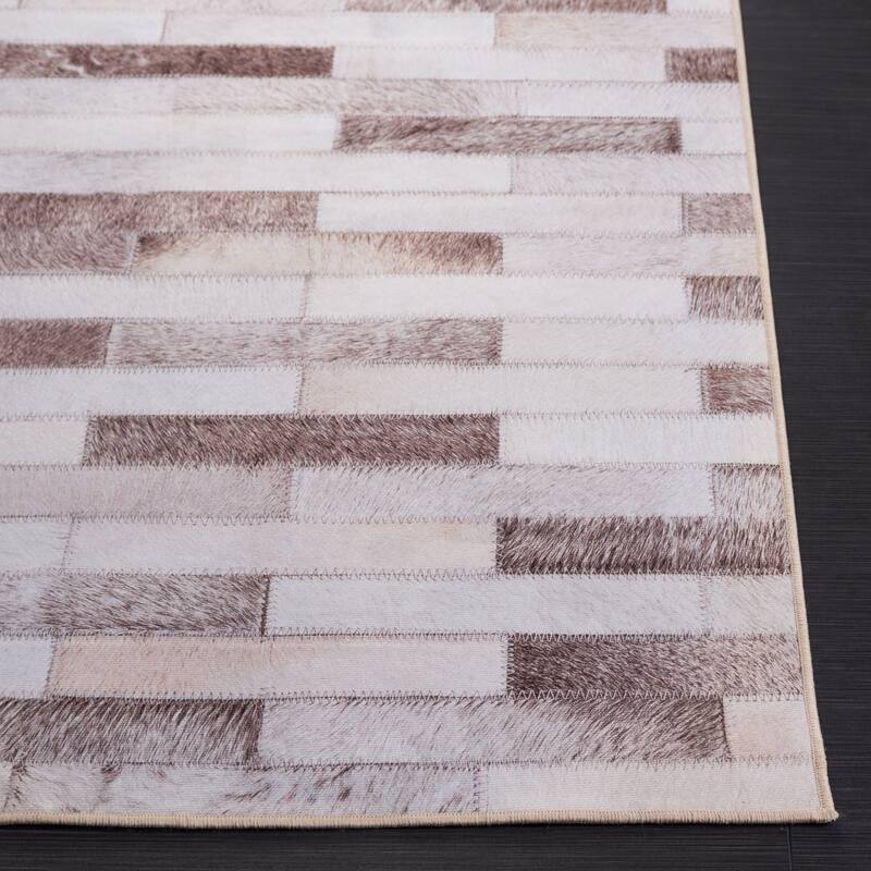 SAFAVIEH Faux Hide Machine Washable Slip Resistant Nieve Modern