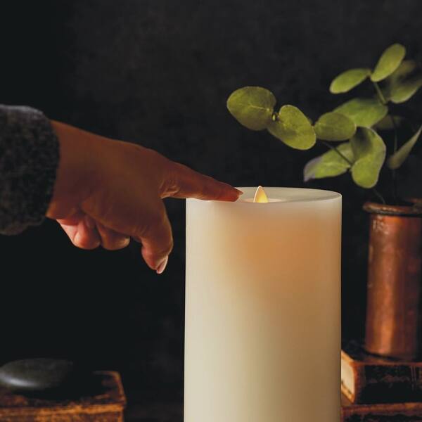 Ivory Flameless Candle Retractable Pillar Flat Top Unscented 3.8" x 8.6" by LightLi Bed