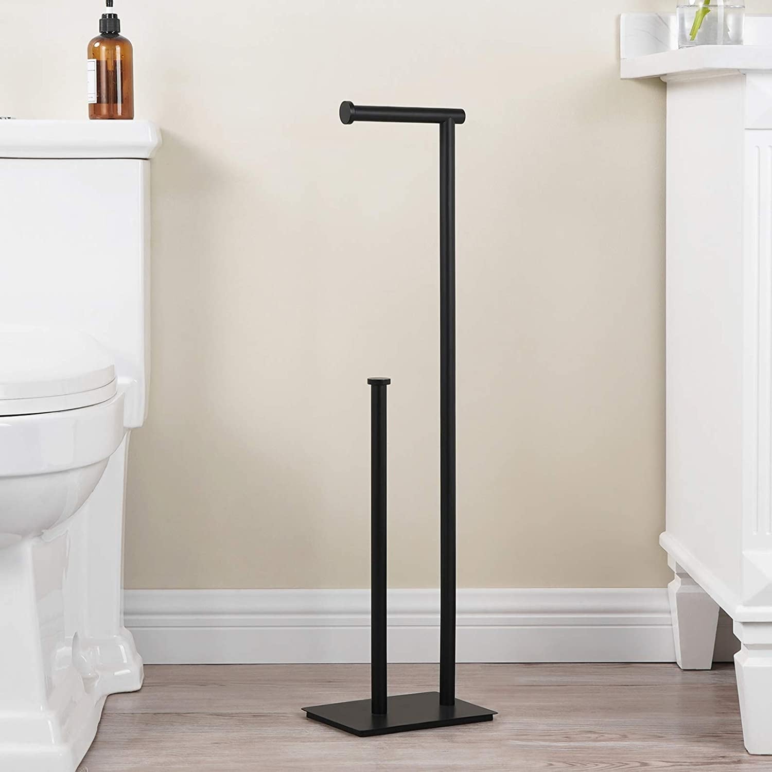 https://ak1.ostkcdn.com/images/products/is/images/direct/90a9a1bc439f6596cb117426714d605697d7eaed/29%22-Height-Freestanding-Toilet-Paper-Holder-with-Reserve.jpg
