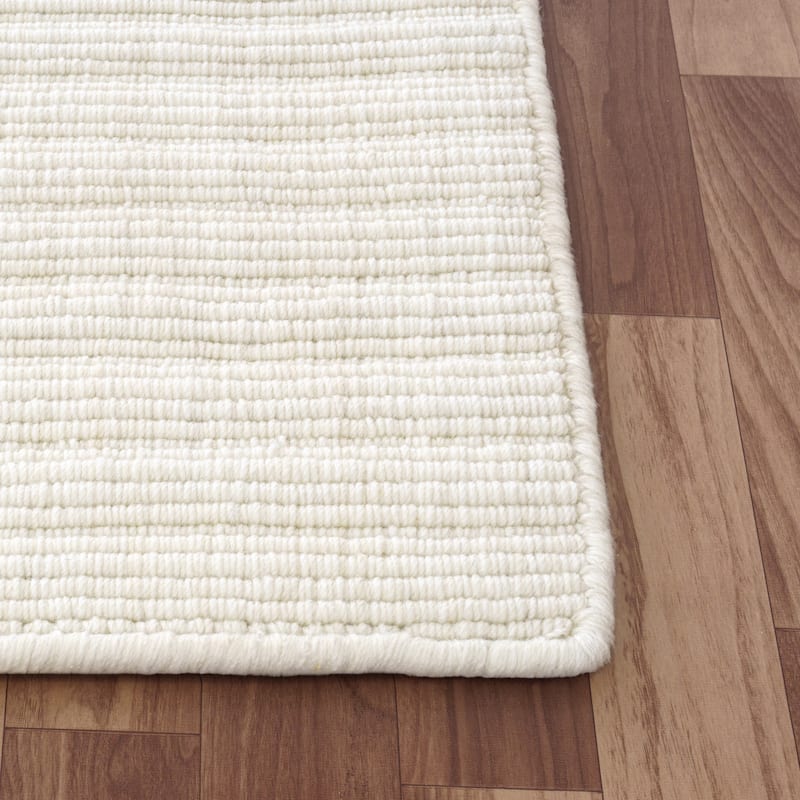 Sevita Solid Casual Hand-Woven Woolen Area Rug