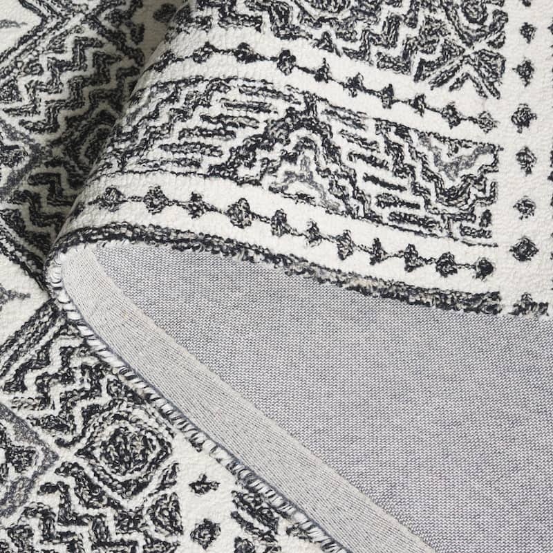 SAFAVIEH Handmade Micro-Loop Jelske Wool Rug
