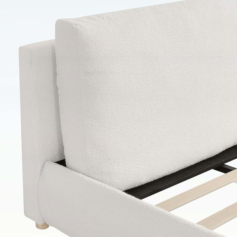 Luxurious Upholstered Platform Bed with Versatile Pillows and Graceful Headboard