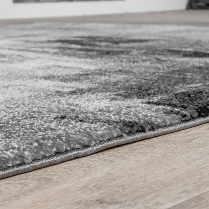 Artful Area Rug with Mottled Design Pattern in Grey