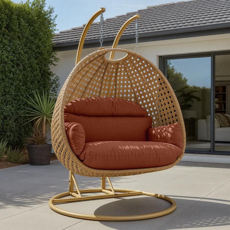 LeisureMod Mendoza 2-Person Hanging Egg Swing Chair - Handcrafted Light Brown Wicker, Patio Hammock Lounger with Cushions