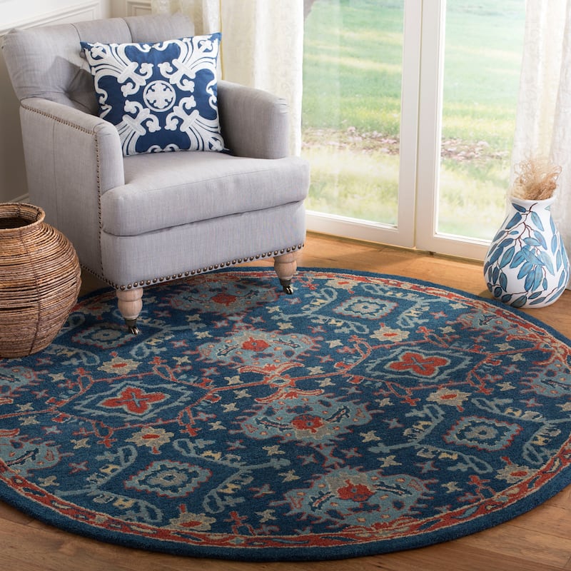 SAFAVIEH Handmade Heritage Pauliina Traditional Oriental Wool Rug - 4' Round - Blue/Multi