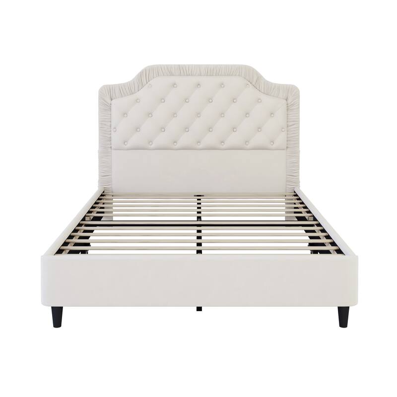 Upholstered bed with pleated trim and button tufted headboard