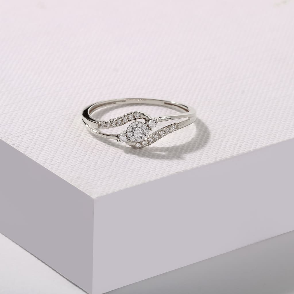 1/8ct TDW Bypass Cluster Diamond Ring in 10K White Gold for Women