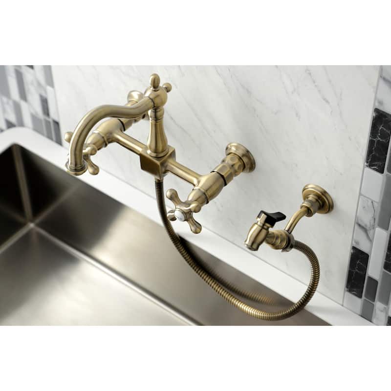 Kingston Brass Heritage Wall Mount Bridge Kitchen Faucet with Brass Sprayer