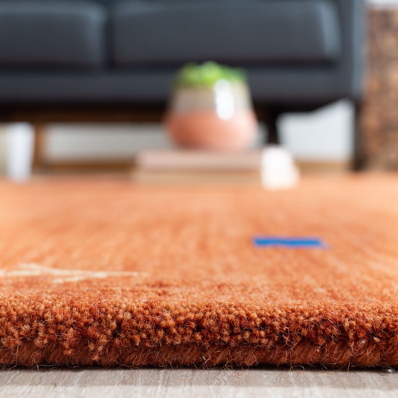 SAFAVIEH Handmade Himalaya Breann Border Wool Rug