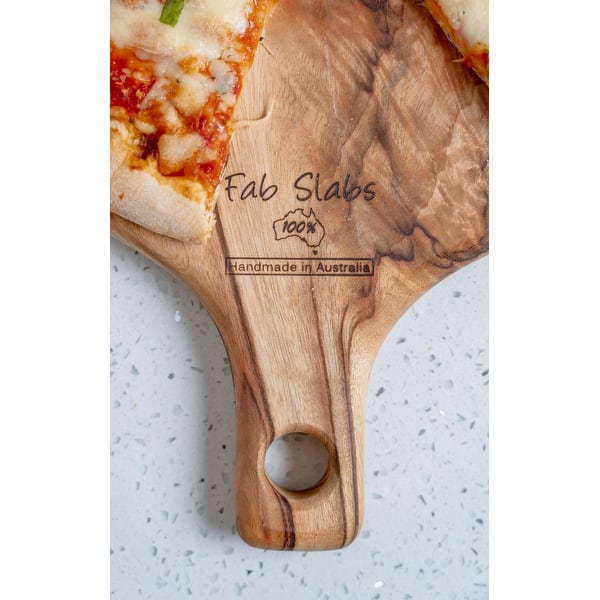 https://ak1.ostkcdn.com/images/products/is/images/direct/919e416468b67f0c761671aae33e572af8e18996/FabSlabs-Natural-Wood-Camphor-Laurel-Pizza-Hygienic-Board%2C-11.81%22-x-11.81%22.jpg?impolicy=medium