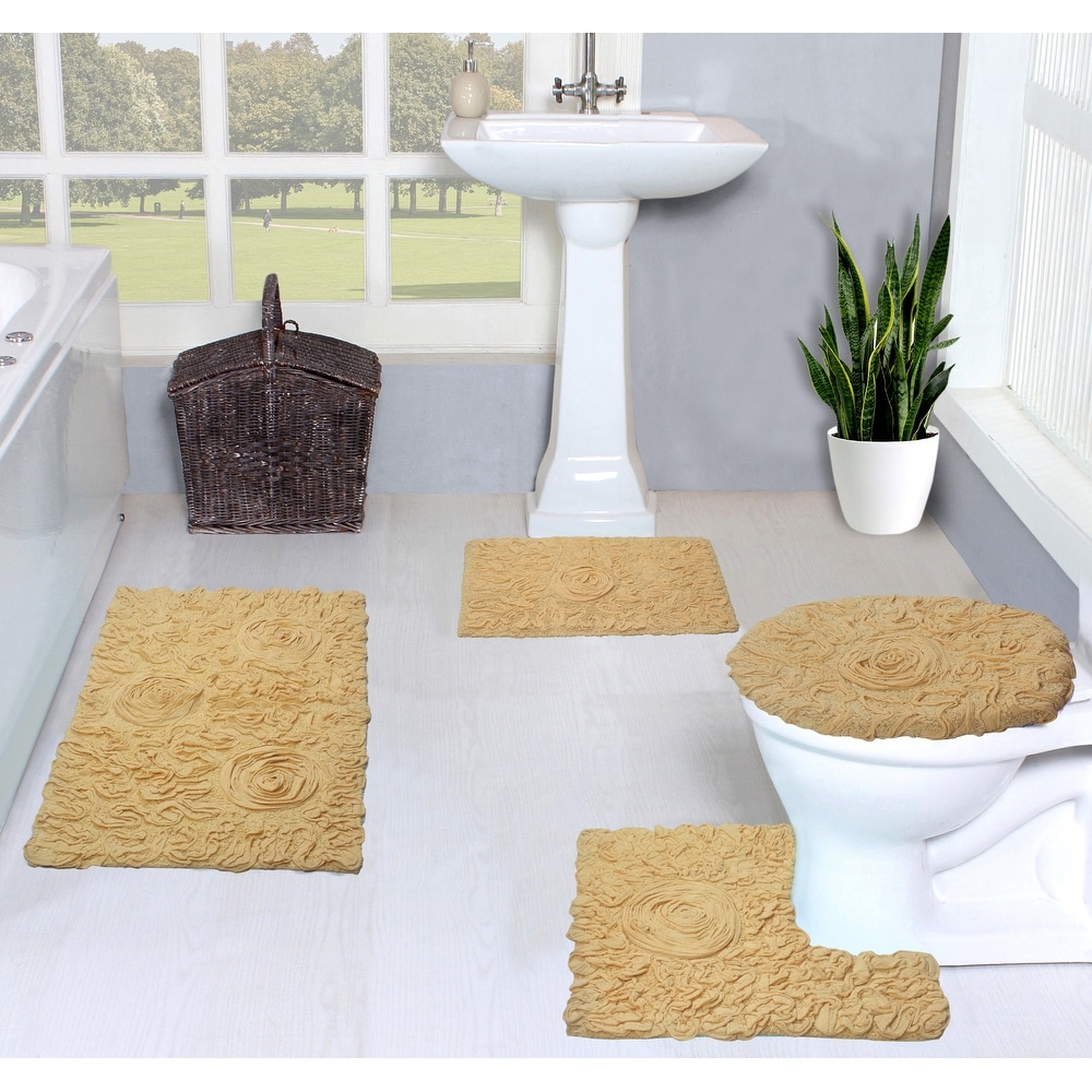 https://ak1.ostkcdn.com/images/products/is/images/direct/91b5d9fe149bcc0d3828c603e6d04c5f87ac9bc4/Bell-Flower-Bathroom-Rug%2C-Cotton-Soft%2C-Water-Absorbent-Bath-Rug%2C-Non-Slip-Shower-Rug-4-Piece-Set-with-Toilet-Lid-Cover.jpg