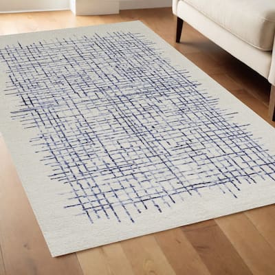 Sixu Hand Tufted Stain Resistant Area Rug By HomeRoots - 66' X '42' X '0.5