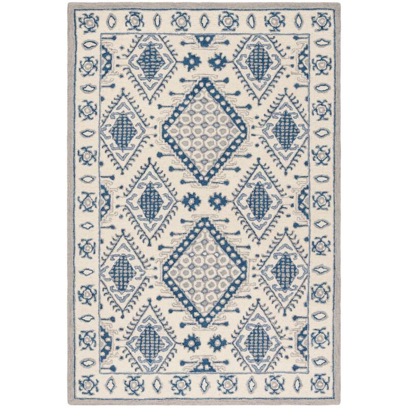 SAFAVIEH Handmade Micro-Loop Anouschka Wool Rug - 4' x 6' - Ivory/Blue