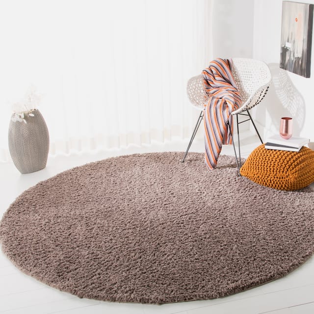 SAFAVIEH August Shag Solid 1.2-inch Thick Area Rug - 6'7" x 6'7" Round - Taupe