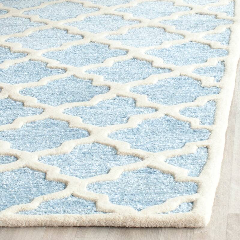 SAFAVIEH Handmade Precious Melanya Modern Polyester Rug