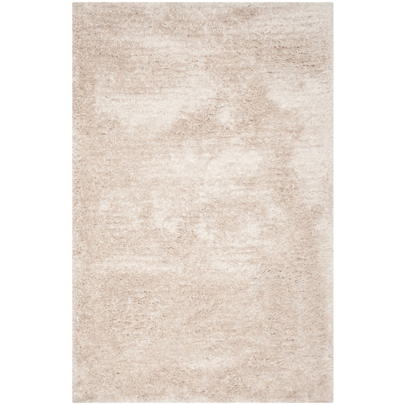SAFAVIEH Handmade South Beach Leonella Shag Solid Polyester Rug