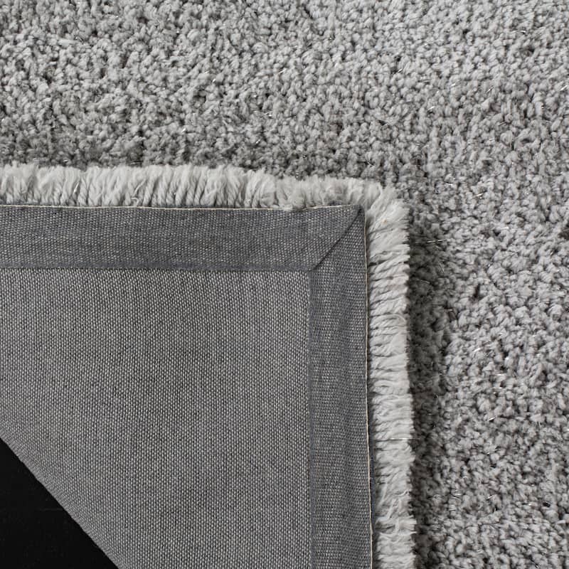 SAFAVIEH Handmade Glamour Shag Ammaria Casual Solid Polyester Rug