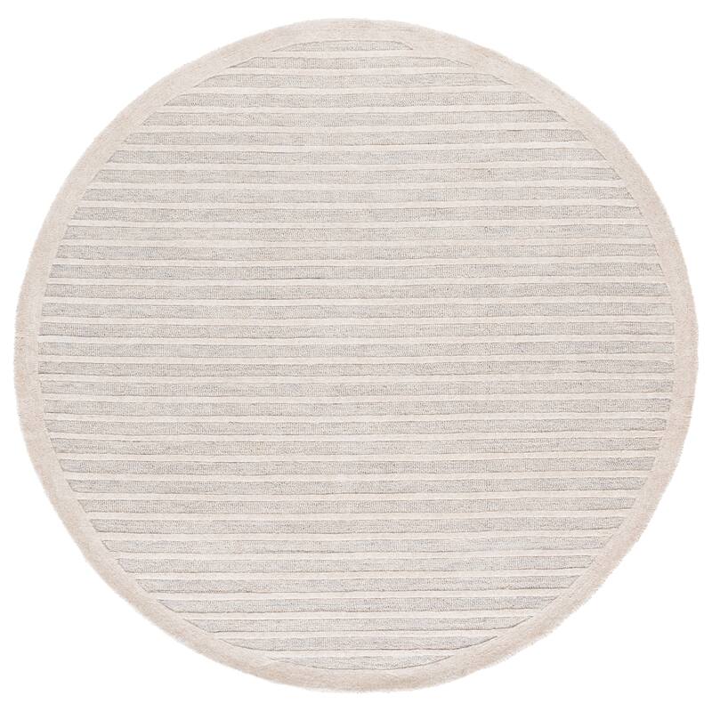 SAFAVIEH Handmade Ebony Sawako Wool Rug - Silver/Ivory - 6' Round