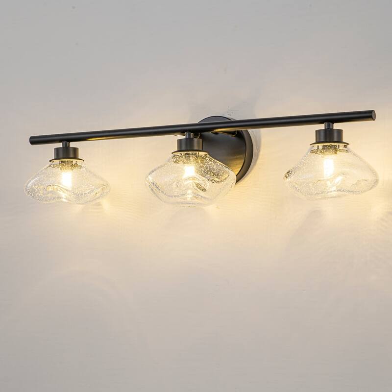 3-Light 24.4" Modern Black/Gold Bathroom Vanity Light with Stone-Shaped Seed Glass Shades - Black/Clear