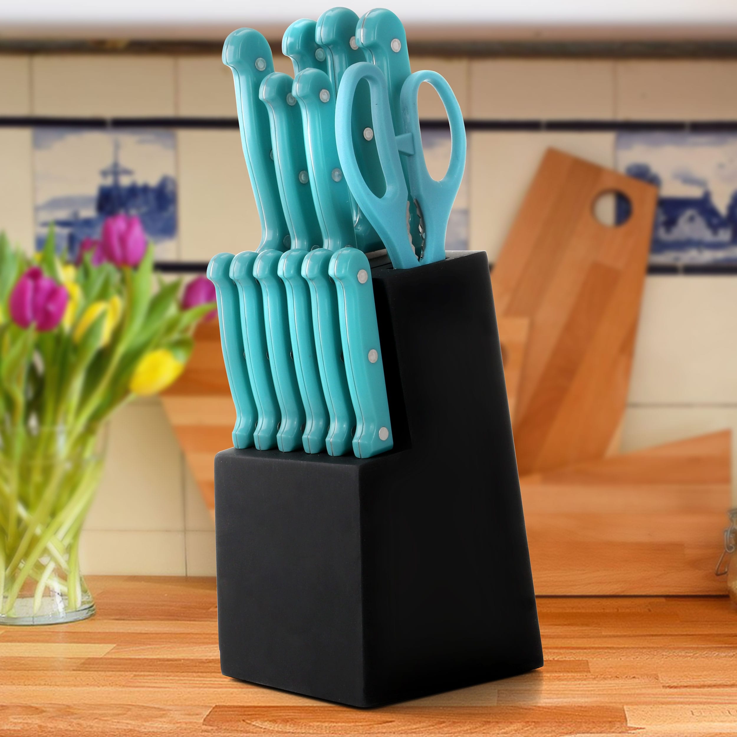 https://ak1.ostkcdn.com/images/products/is/images/direct/92be3593216dfe9cd58d13af0f1bab3dff500bff/MegaChef-14-Piece-Cutlery-Set-in-Teal.jpg