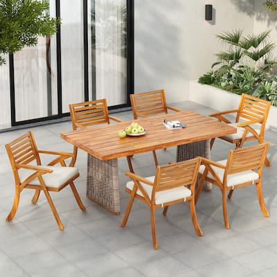 Christopher Knight Home - Elysande Outdoor Acacia Wood 7 Piece Dining Set with Rattan Legs and Water Resistant Cushions