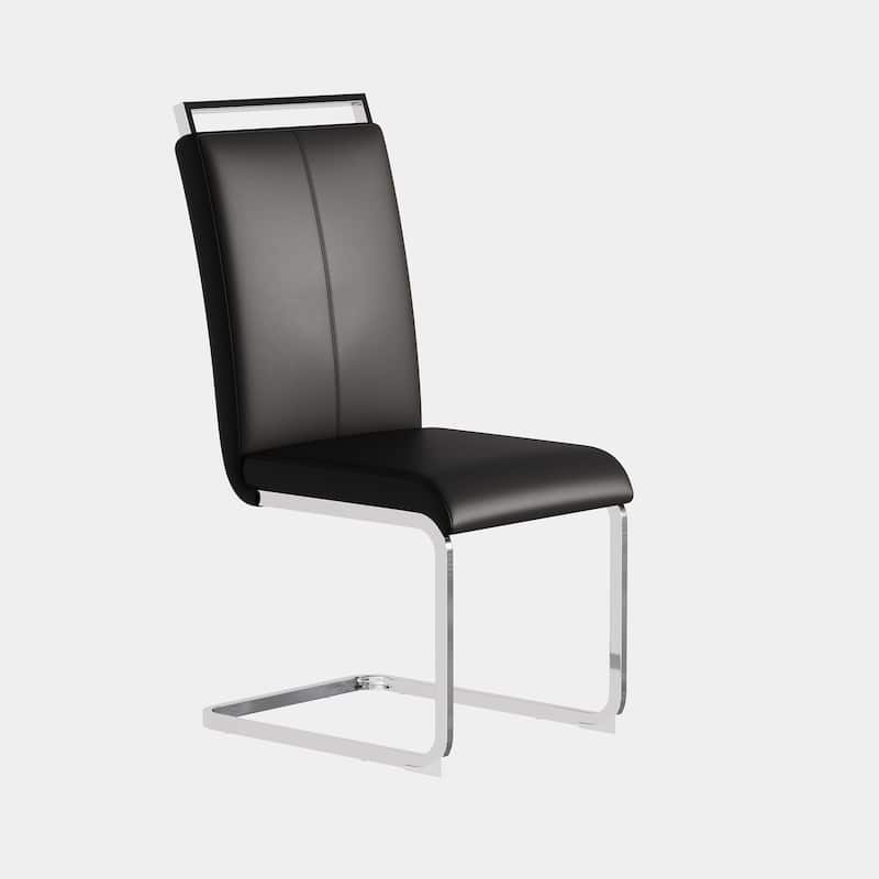 A set of 4 artificial leather dining chairs
