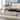 SAFAVIEH Alec Distressed Black Coffee Table - 48" x 24" x 17.7"