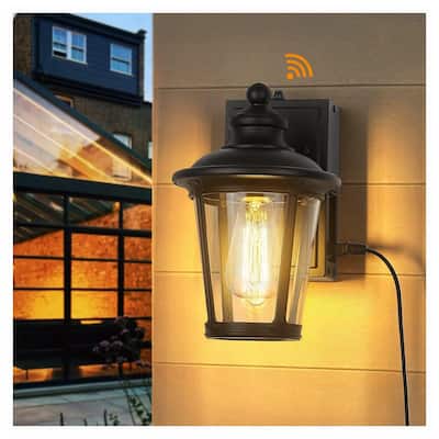 Dusk to Dawn Outdoor Wall Lighting with Built-in GFCI Outlet with Clear Glass, Die-Cast Aluminum in Black Finish