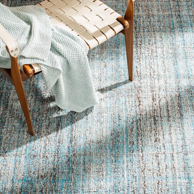 SAFAVIEH Handmade Abstract Nettie Modern Viscose Rug