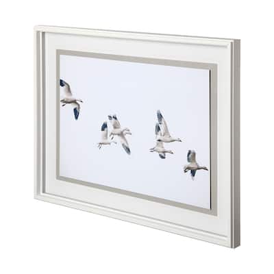 Winged Migration Framed Art Print