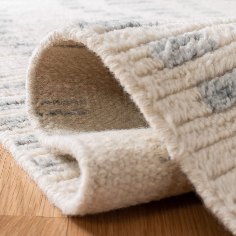SAFAVIEH Hand-Knotted Casablanca Shag Boginja Tribal Wool Rug
