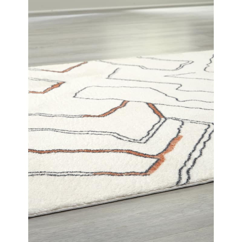 Signature Design by Ashley Cadeworth White/Brown Rug - 7'6"W x 10'D