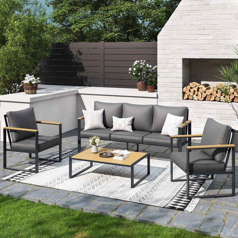 4-Piece Outdoor Sofa Set with Coffee Table and Cushions