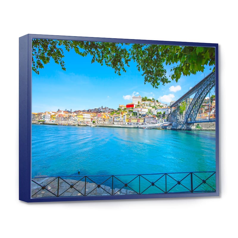 Designart "Douro River and Iron Bridge Portugal" Extra Large Landscape Framed Canvas Art - 32 in. wide x 16 in. high - Blue