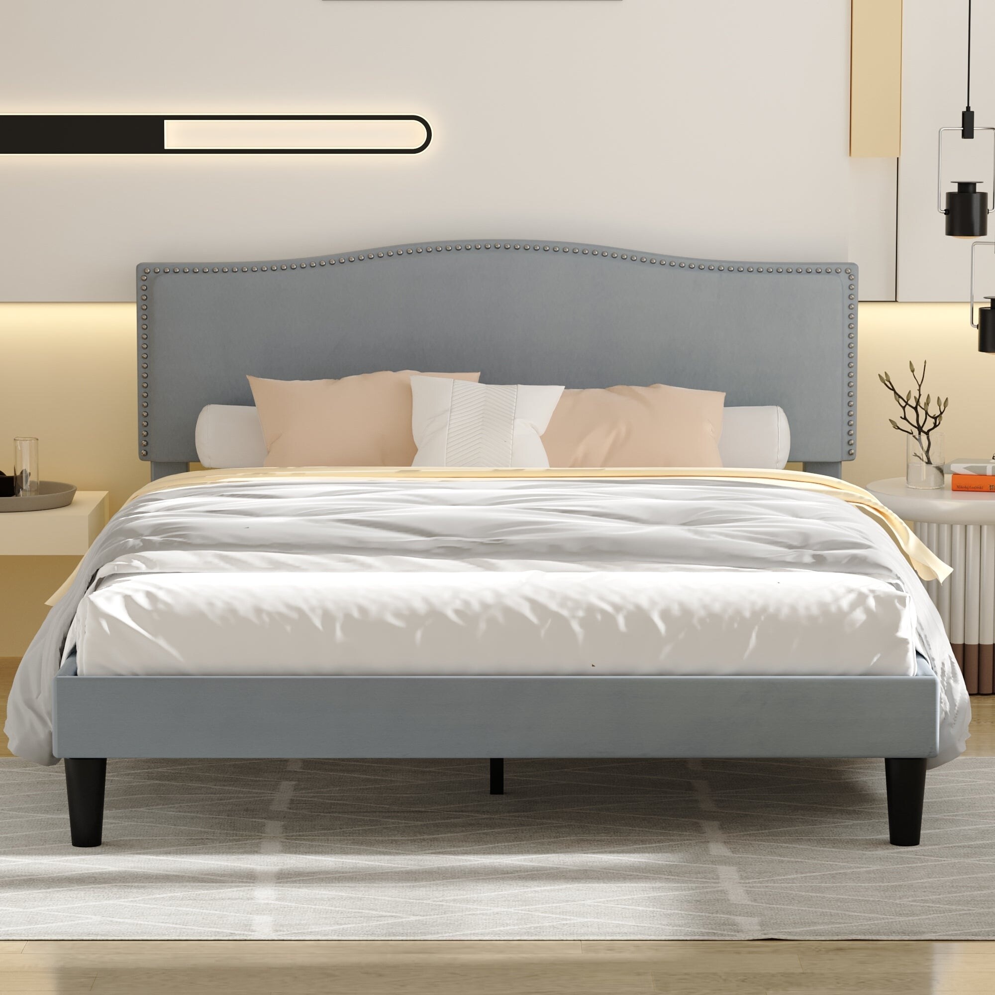 Upholstered nailhead store platform bed