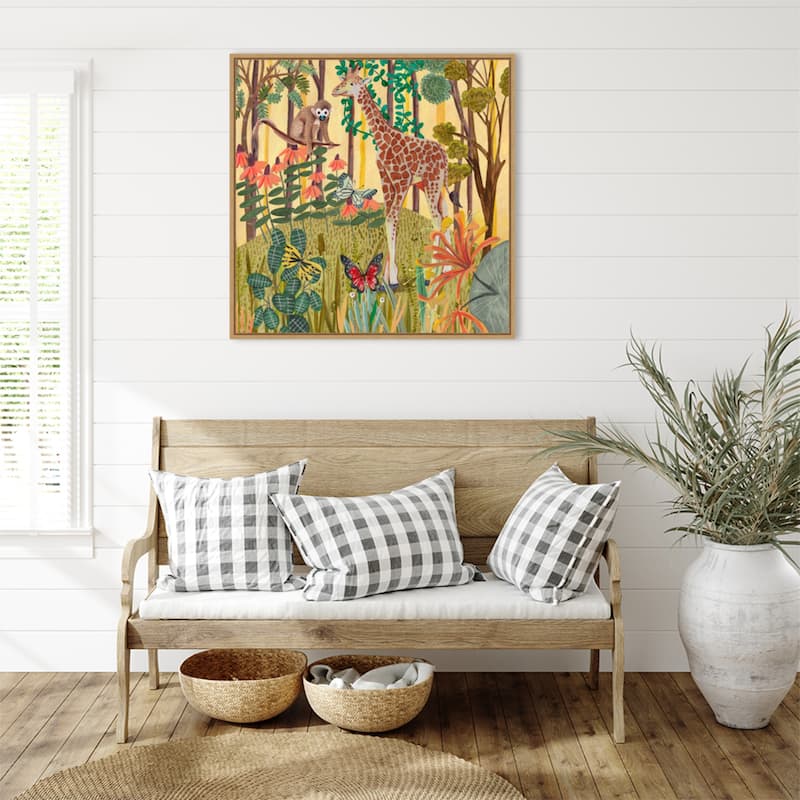 Giraffe in nature by Caroline Bonne Muller Framed Canvas Wall Art