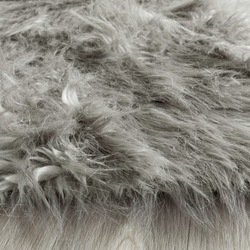 SAFAVIEH Faux Sheep Radena Christen Shag Solid Rug