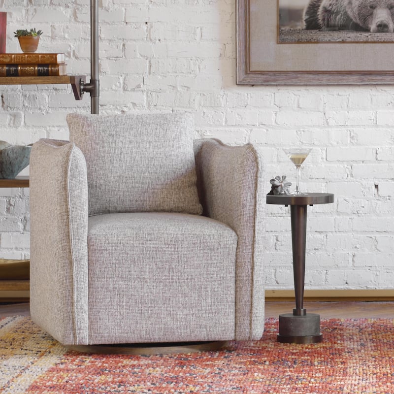 21.75" bronzed metal cylindrical accent table on a gray concrete base
