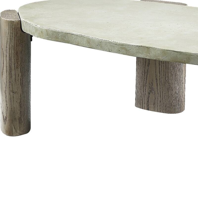 HomeRoots 47" Beige and Oak Distressed Cement Oval Coffee Table - 47.00 in. x 16.00 in. x 28.00 in.