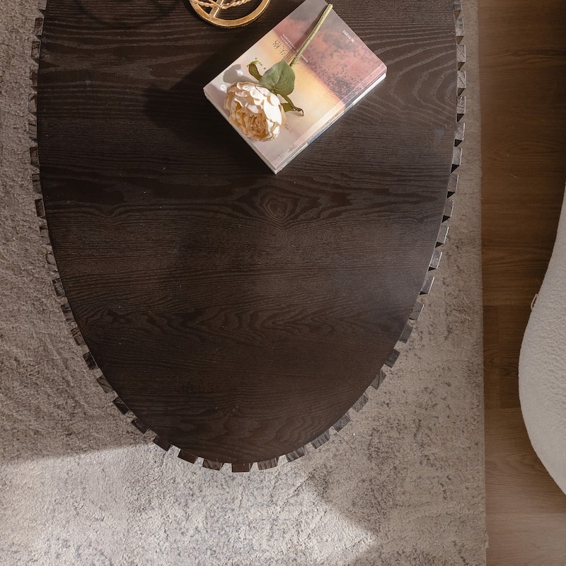 Oval Wooden Coffee Table with Handcrafted Relief and Sturdy Pedestal for Living Room