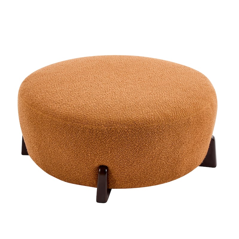 Modish Round Ottoman: Boucle Top with Splayed Rubber Wood Legs, Pumpkin Orange