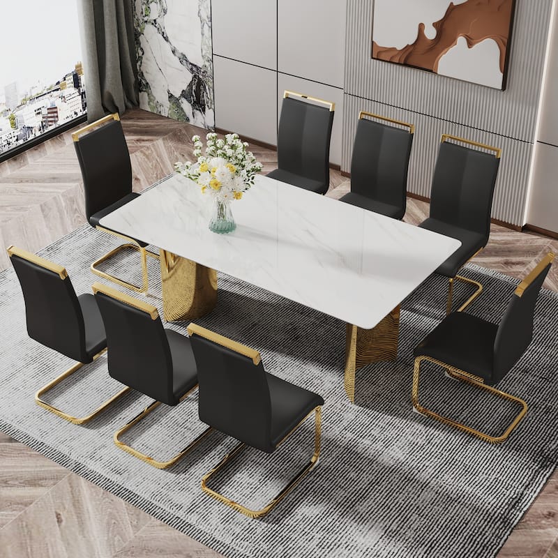 Modern minimalist dining table. The imitation marble glass desktop is equipped with golden metal legs. Suitable for rest