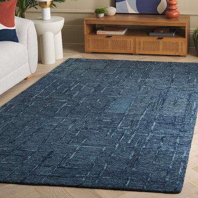 SAFAVIEH Hand-Tufted Ebony Randah Modern & Contemporary Wool Rug