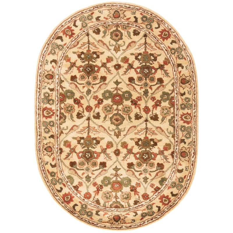 SAFAVIEH Handmade Antiquity Smiljka Traditional Oriental Wool Rug - 4'6" x 6'6" Oval - Gold